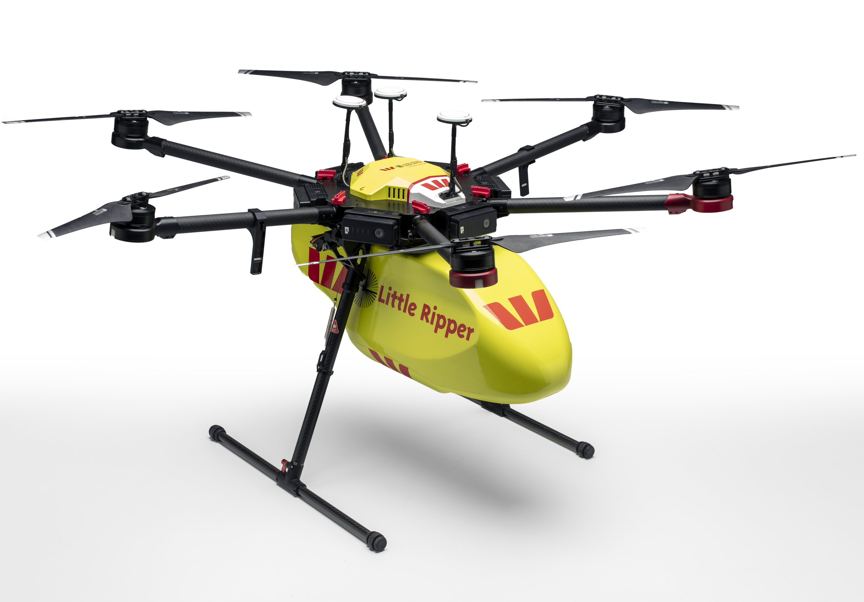 Unmanned Aerial Vehicle (UAV) or drone built with six foldable rotors, which are stored within black pouches that close with zippers. The main body is bright yellow so the UAV is easily spotted. It has red ‘W’ to the sides as well as an inscription on red that reads ‘Little Ripper’. The UAV has two black landing slides to the sides.