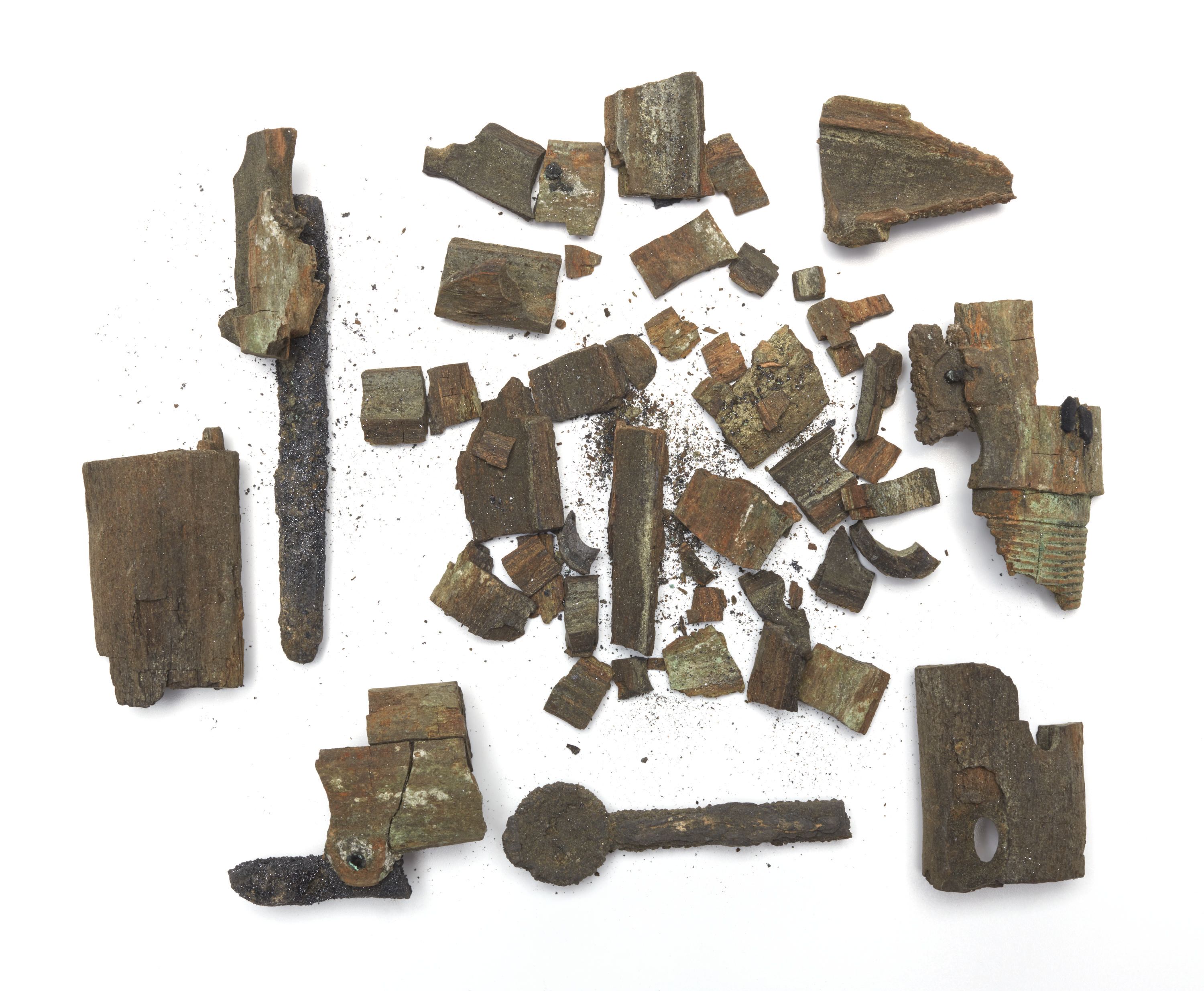 broken pieces of a wooden flute