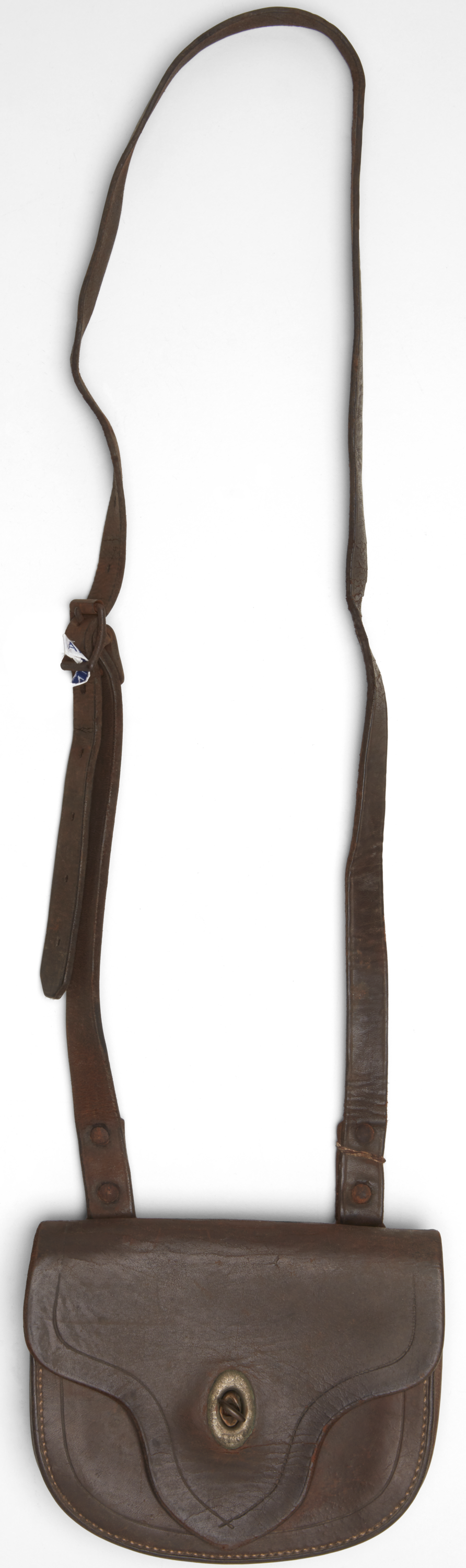 Brown eather tool belt and pouch used while working in the Halvorsen boat yard.