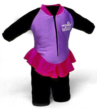 Childs one peice swimwear with purple body, black shorts and sleeves, a pink skirt and black zipper.