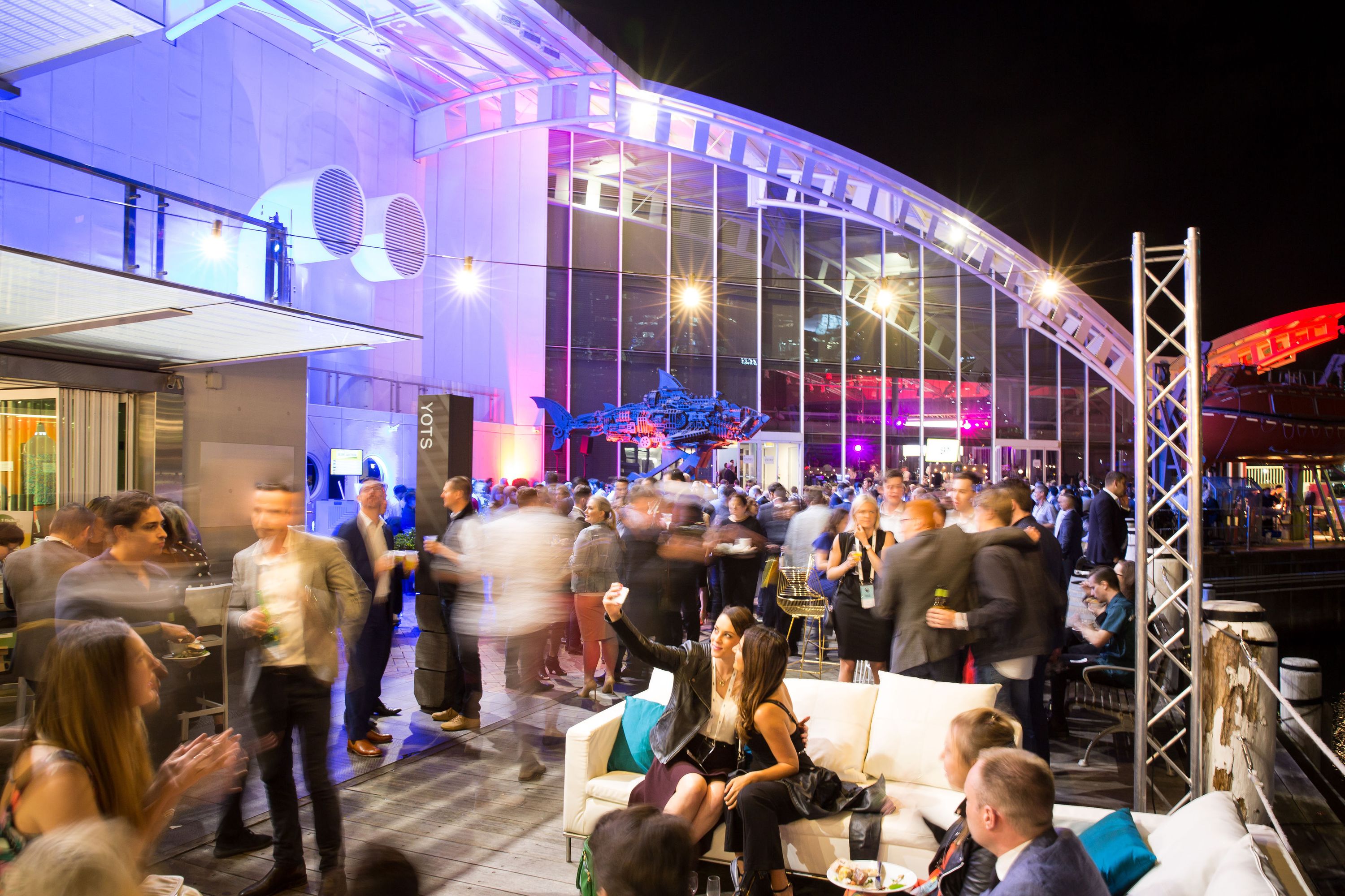 The museum precinct filled with crowds during a corporate event