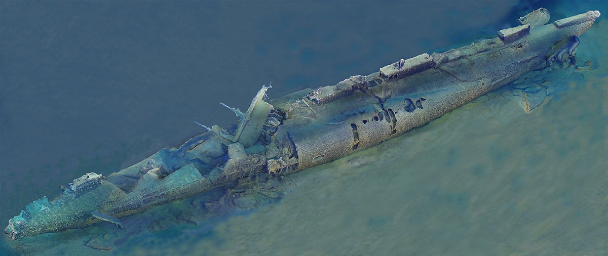 Image showing a 3D computer model of the shipwreck of a badly damaged submarine.