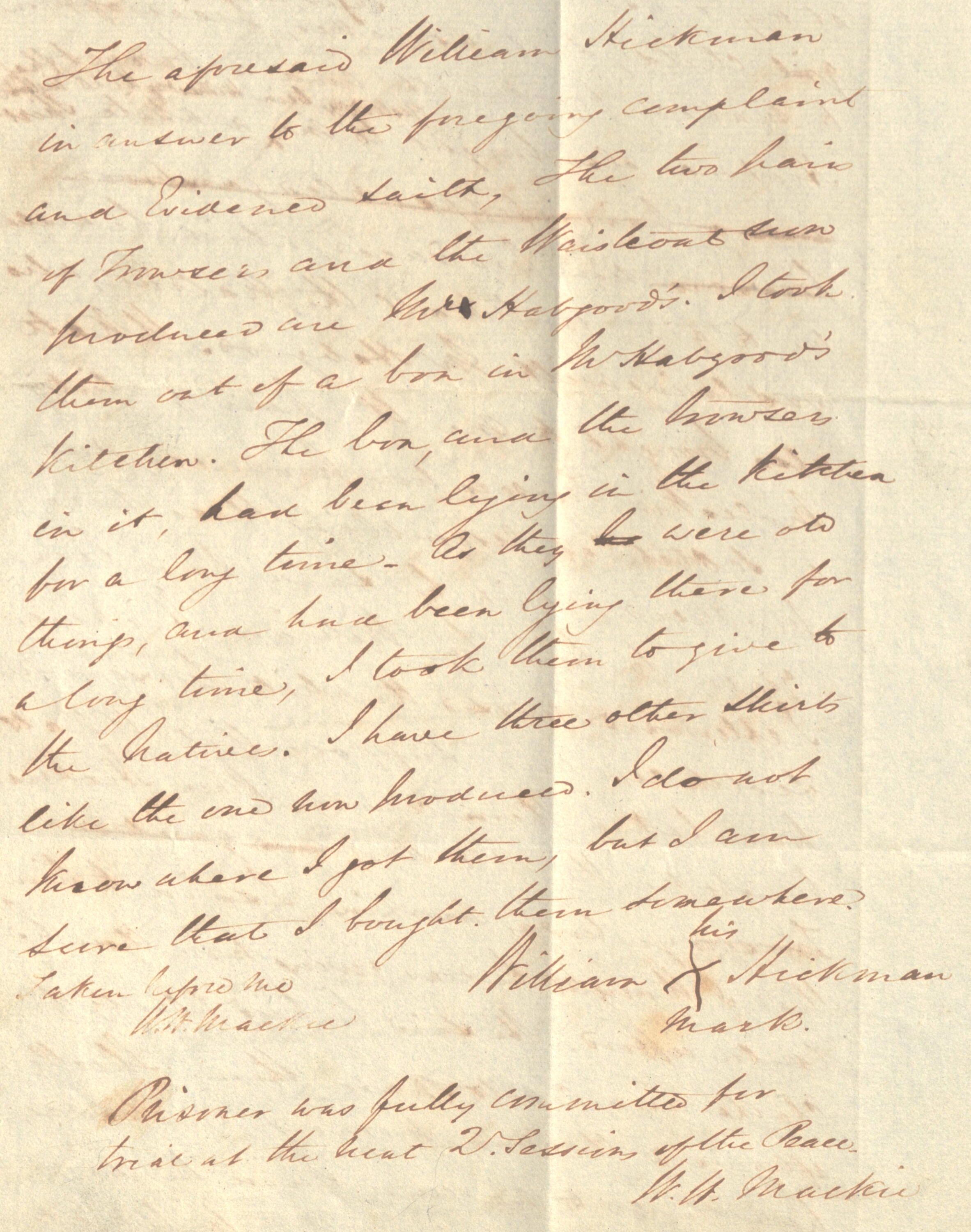 Off white paper with brown cursive script hand written on it.