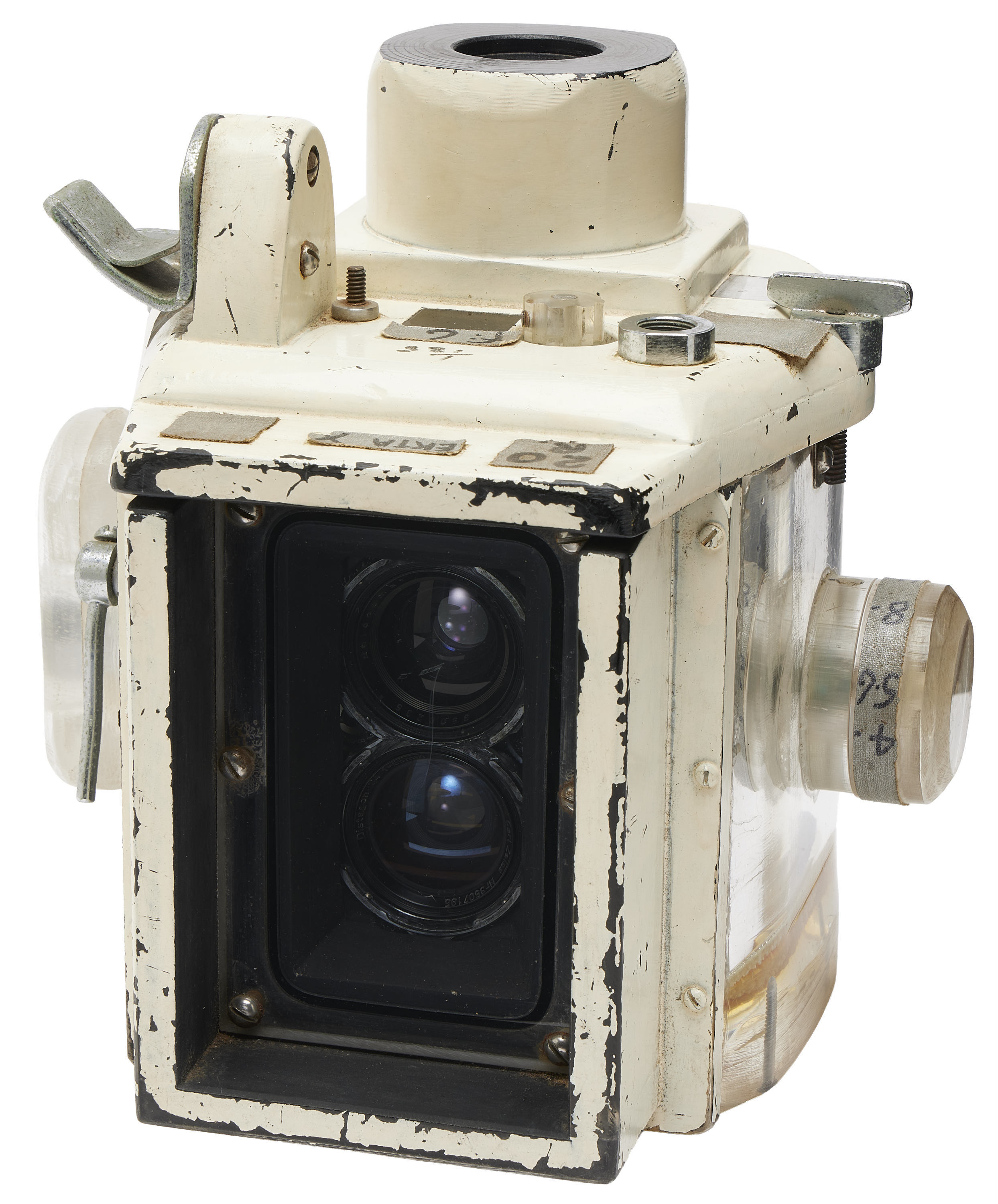 Photo of a custom made, glass and white case to protect a camera underwater.