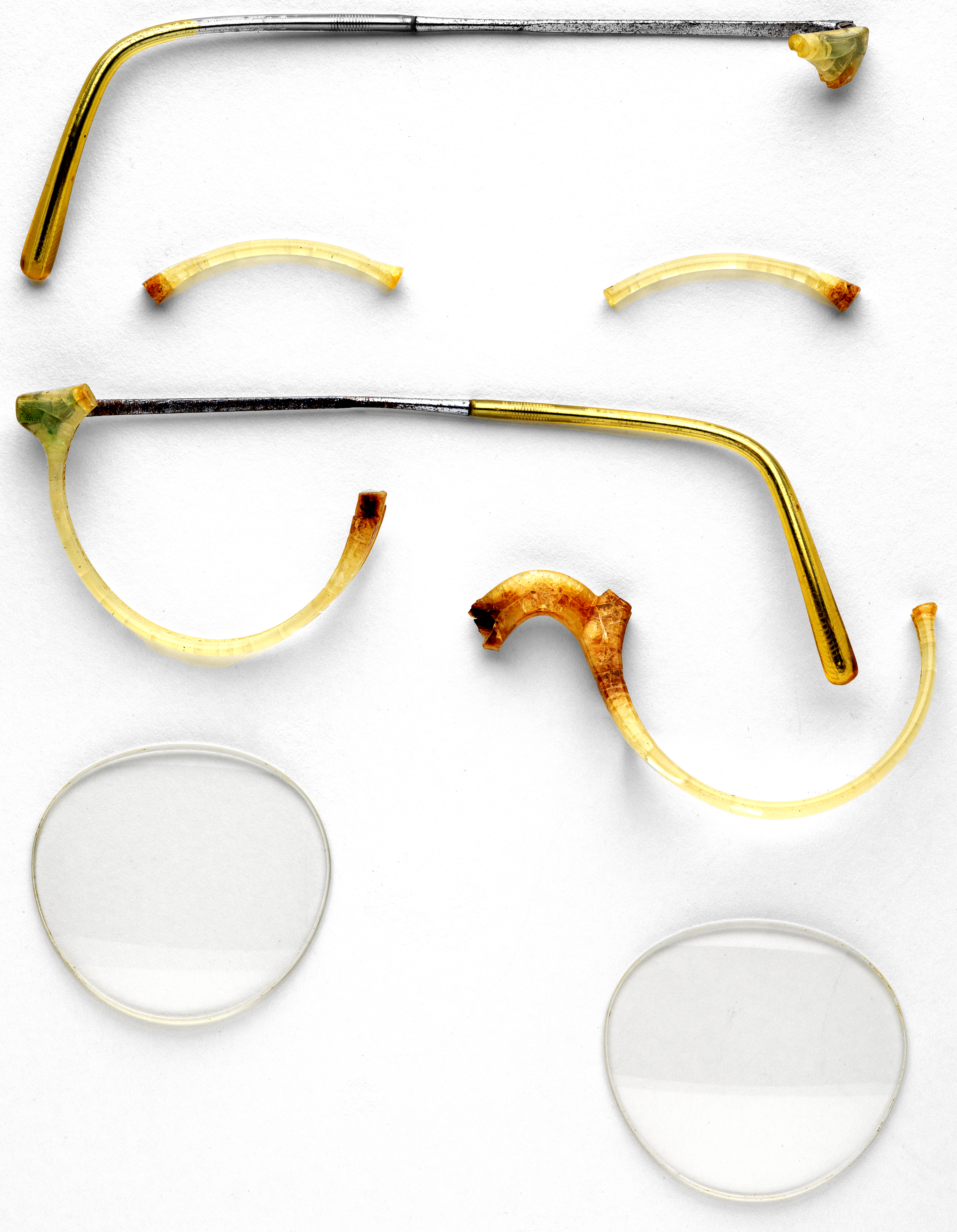 Pair of old spectacles in parts