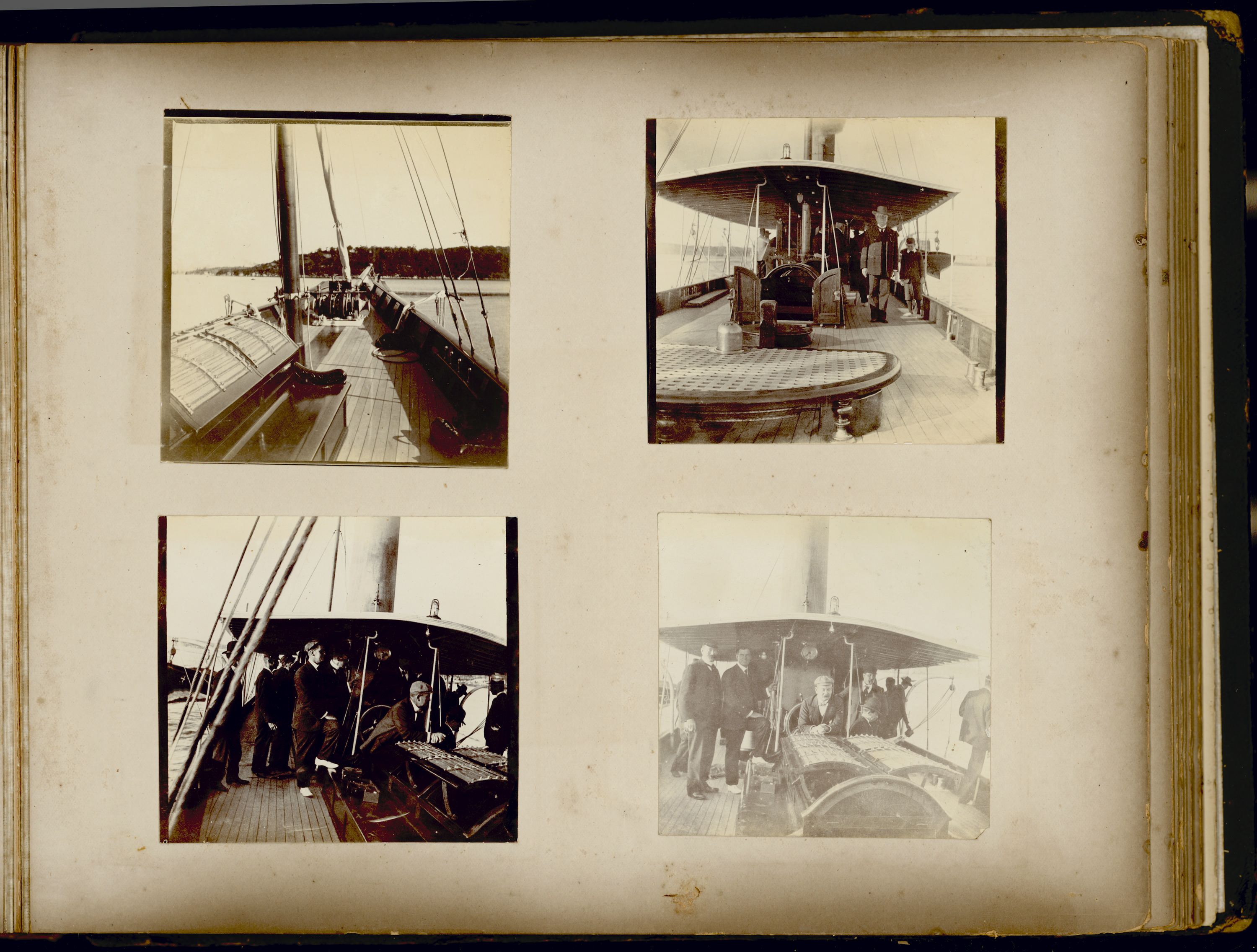 Photo album page with 4 black and white images of people on a boat. 