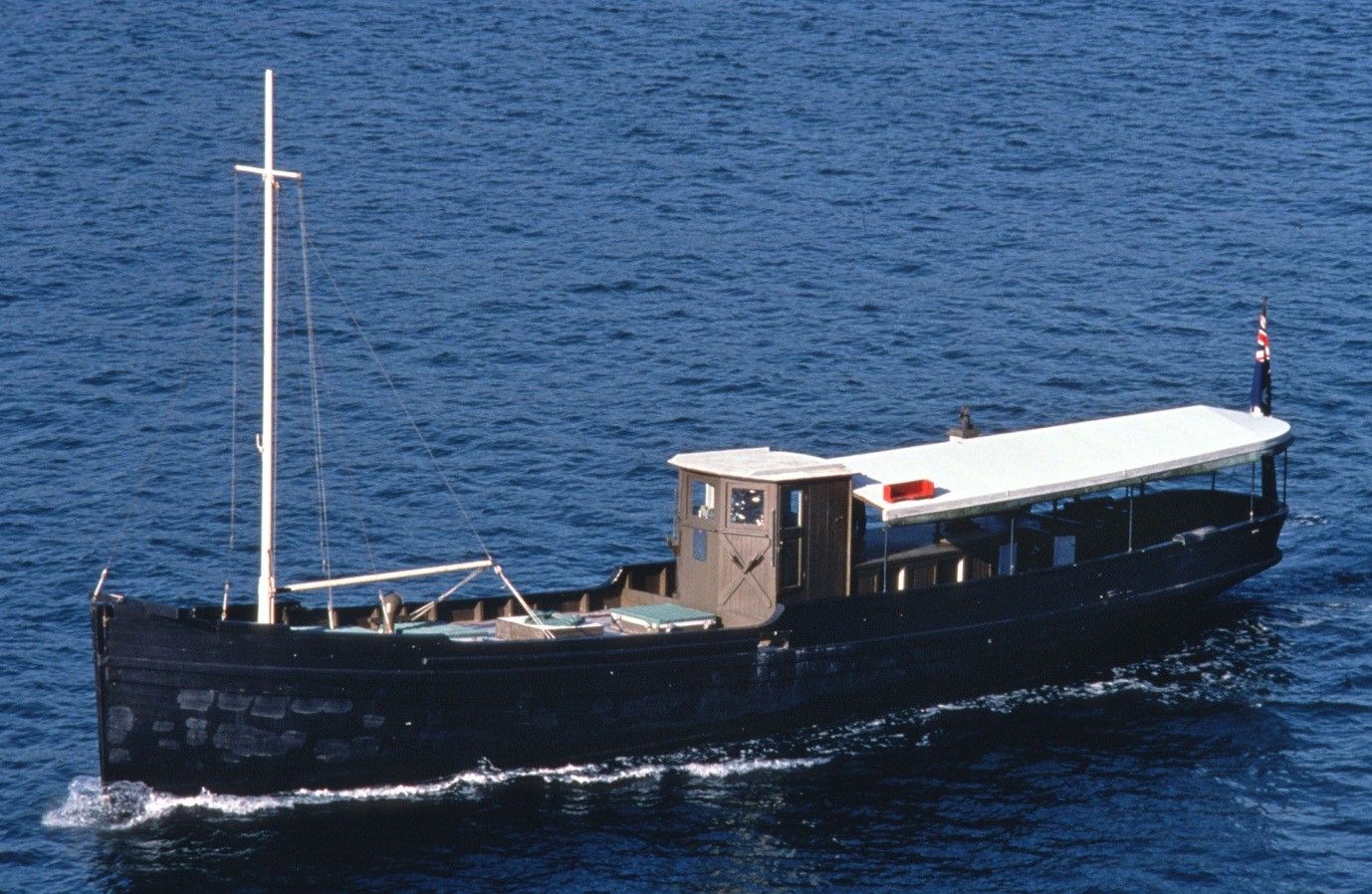 Aerial photograph of a wooden fishing boat.