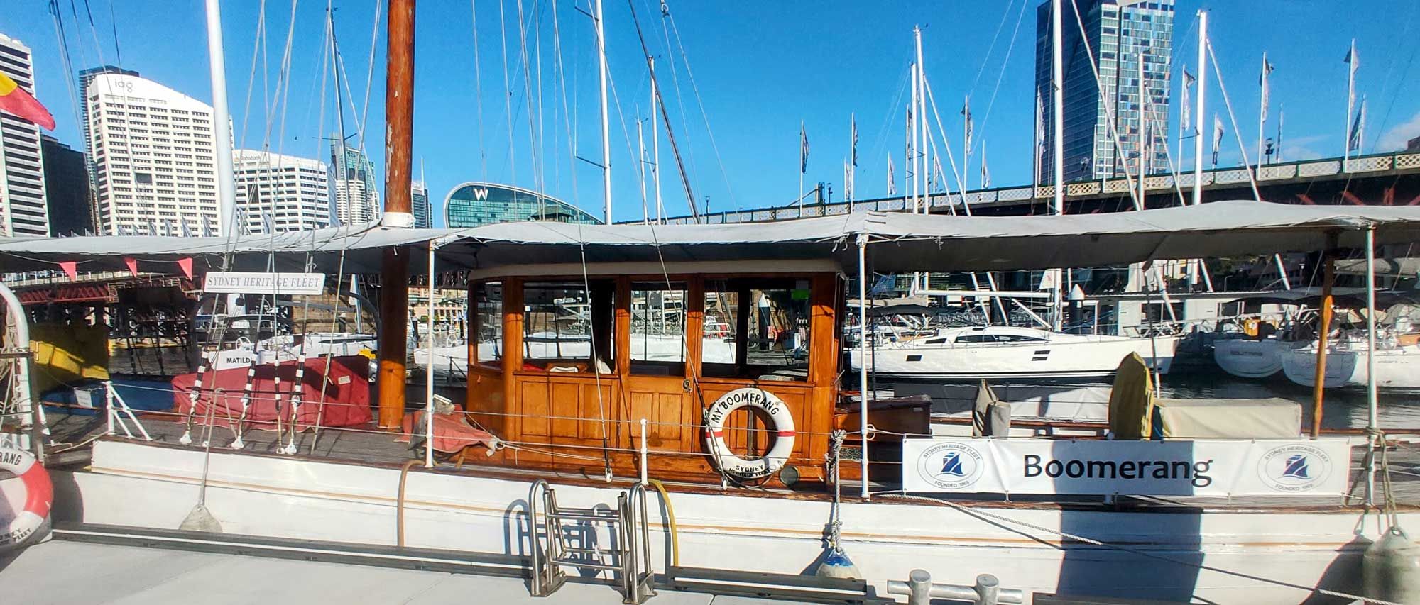 Photo of a boat tied up along a wharf.