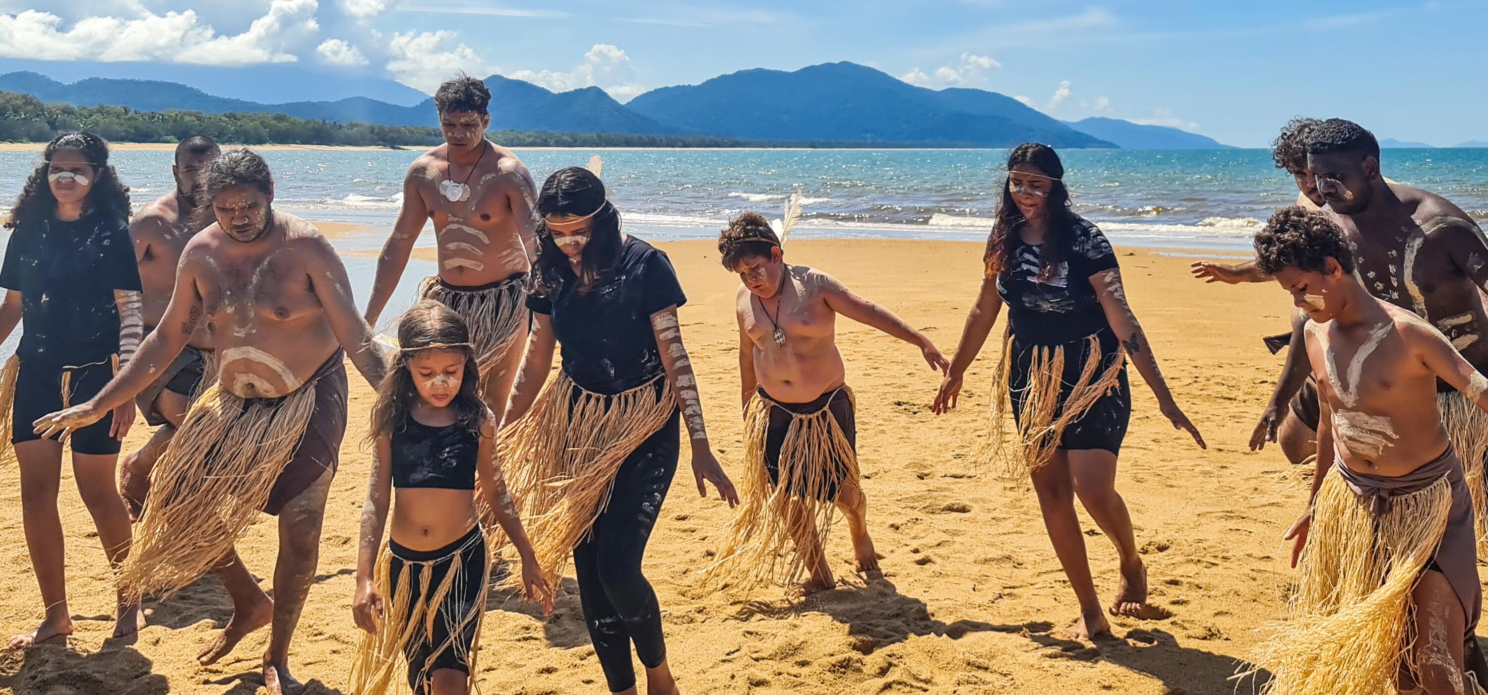 The Yidinji Dancers performing Birriniy on Bramston Beach in Queensland