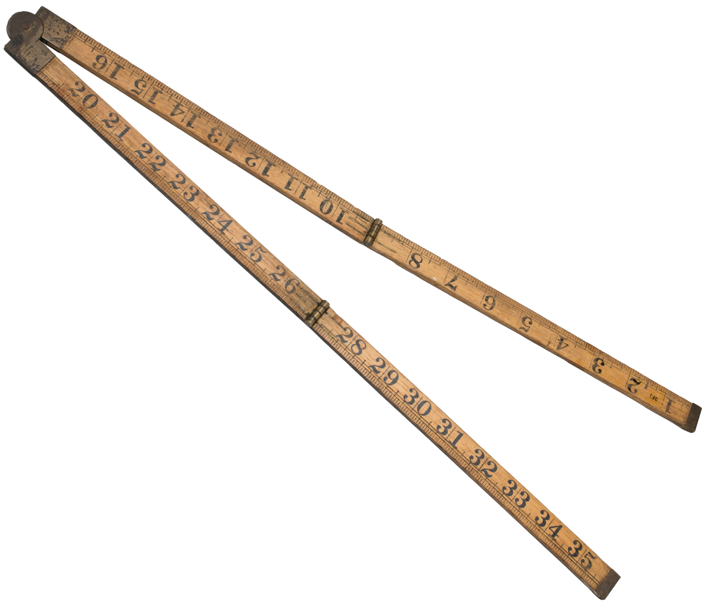 tradesman's wooden folding ruler, made up from four sections, folded in half. It is an imperial scale and marked in inches. 