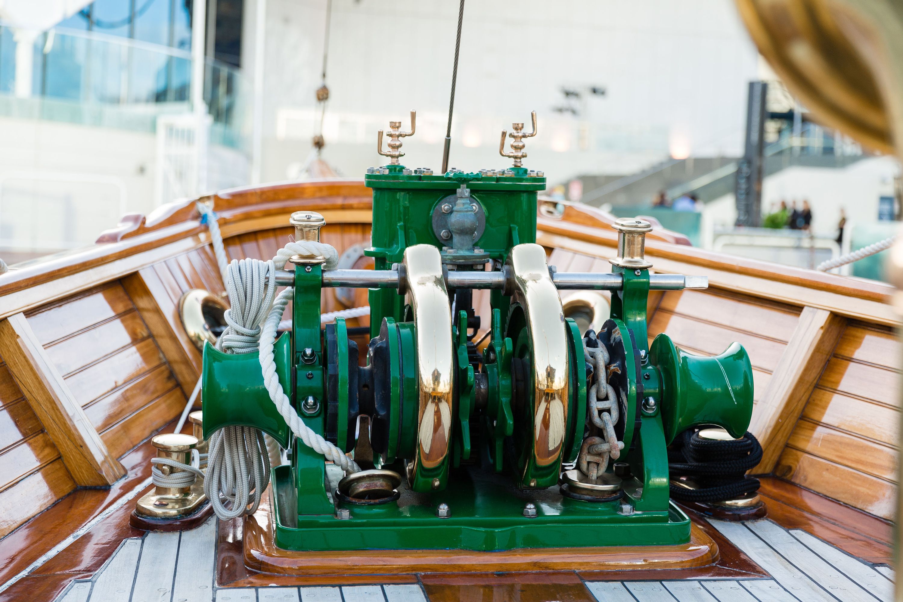 A detail photograph of the vessel - green and brass winch