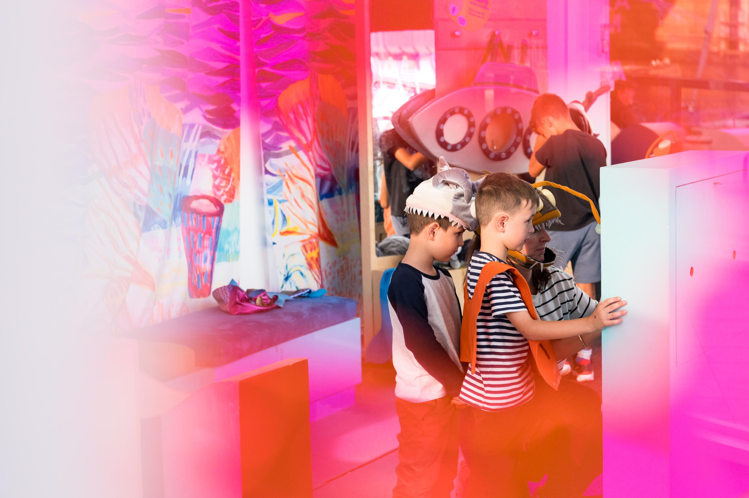 Photo of a family wearing dress ups. 