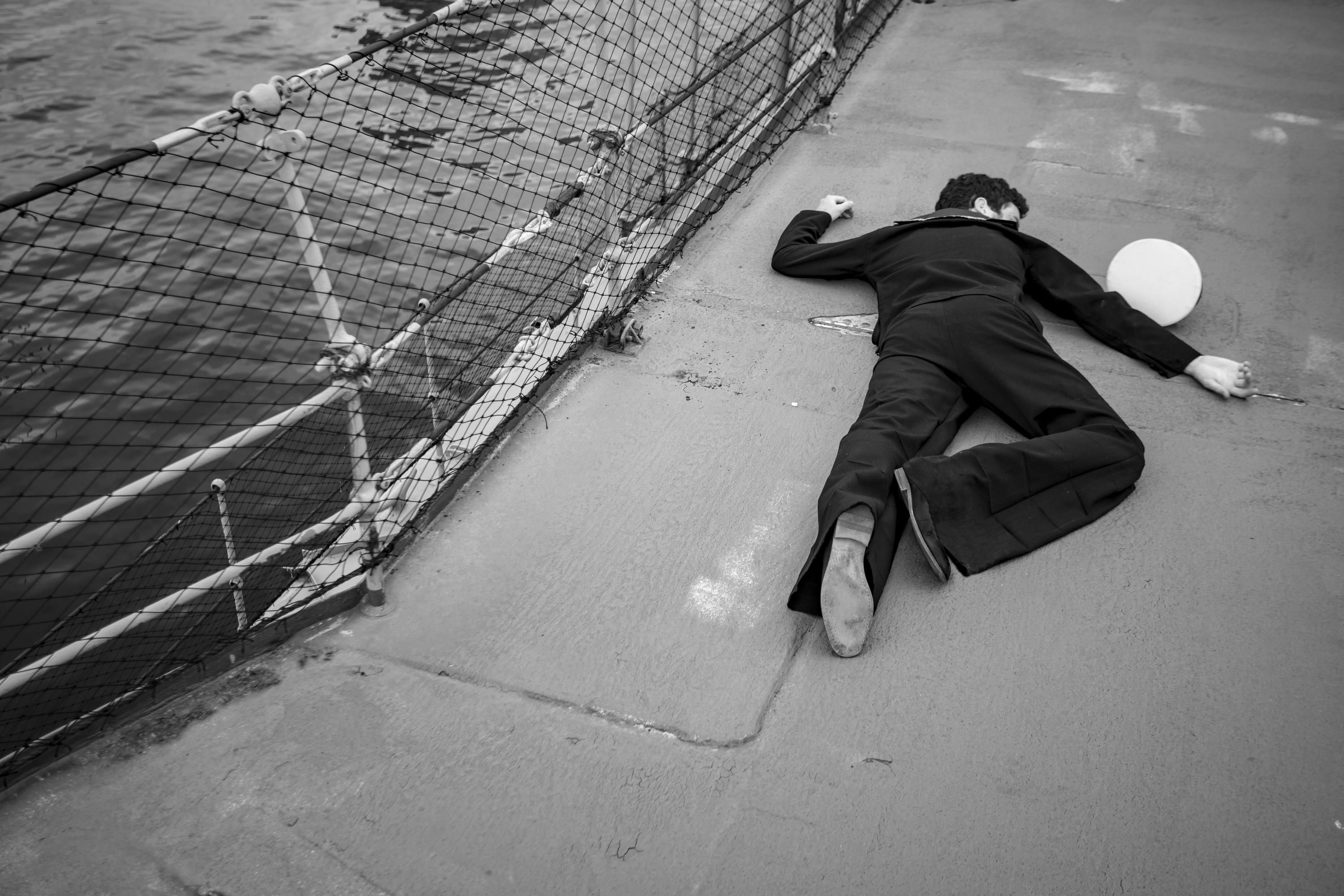 A person, posed as a dead sailor, the victim of a murder on board HMAS VAMPIRE