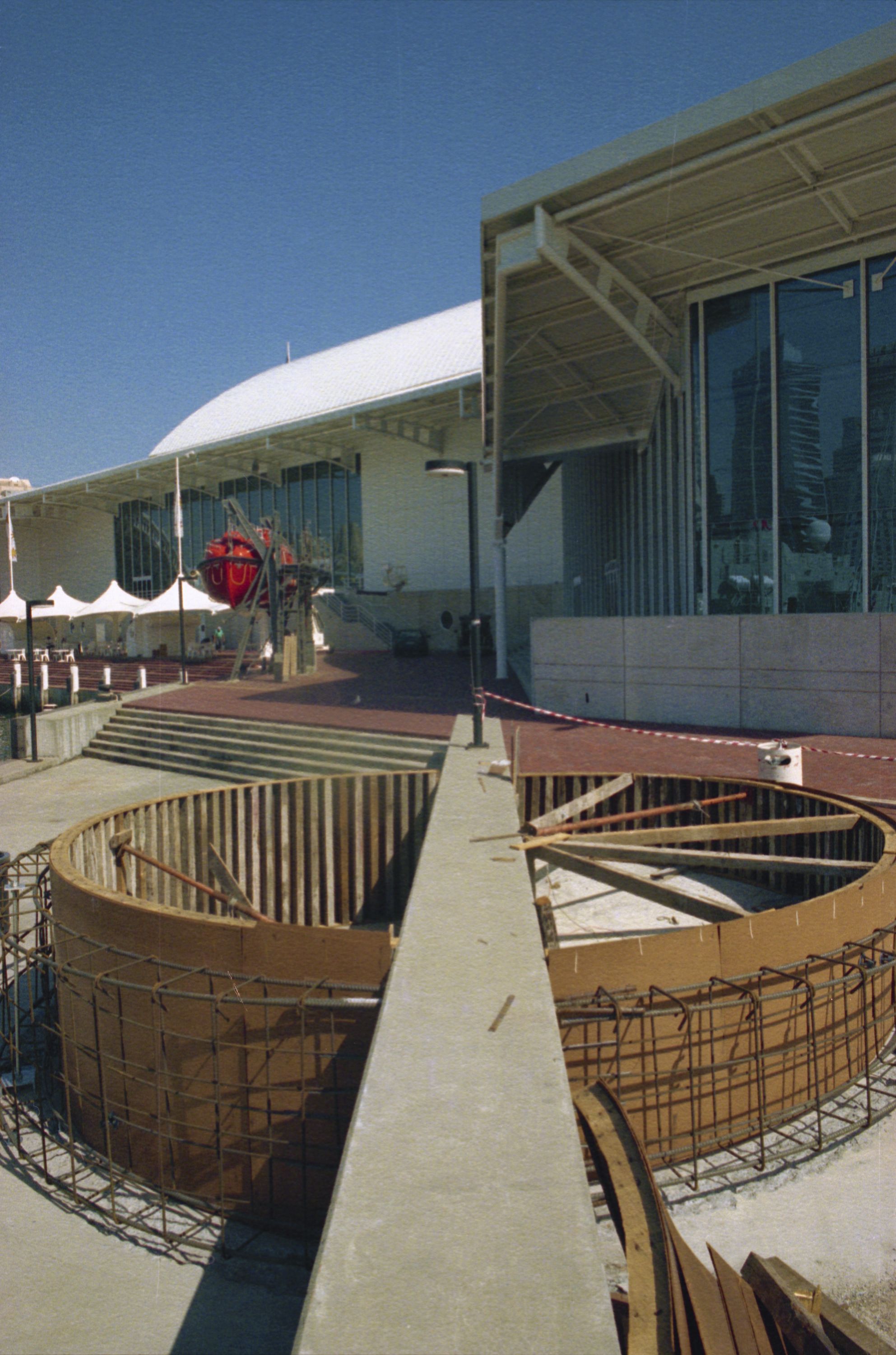 Photo showing the round foundations being laid for a lighthouse. 