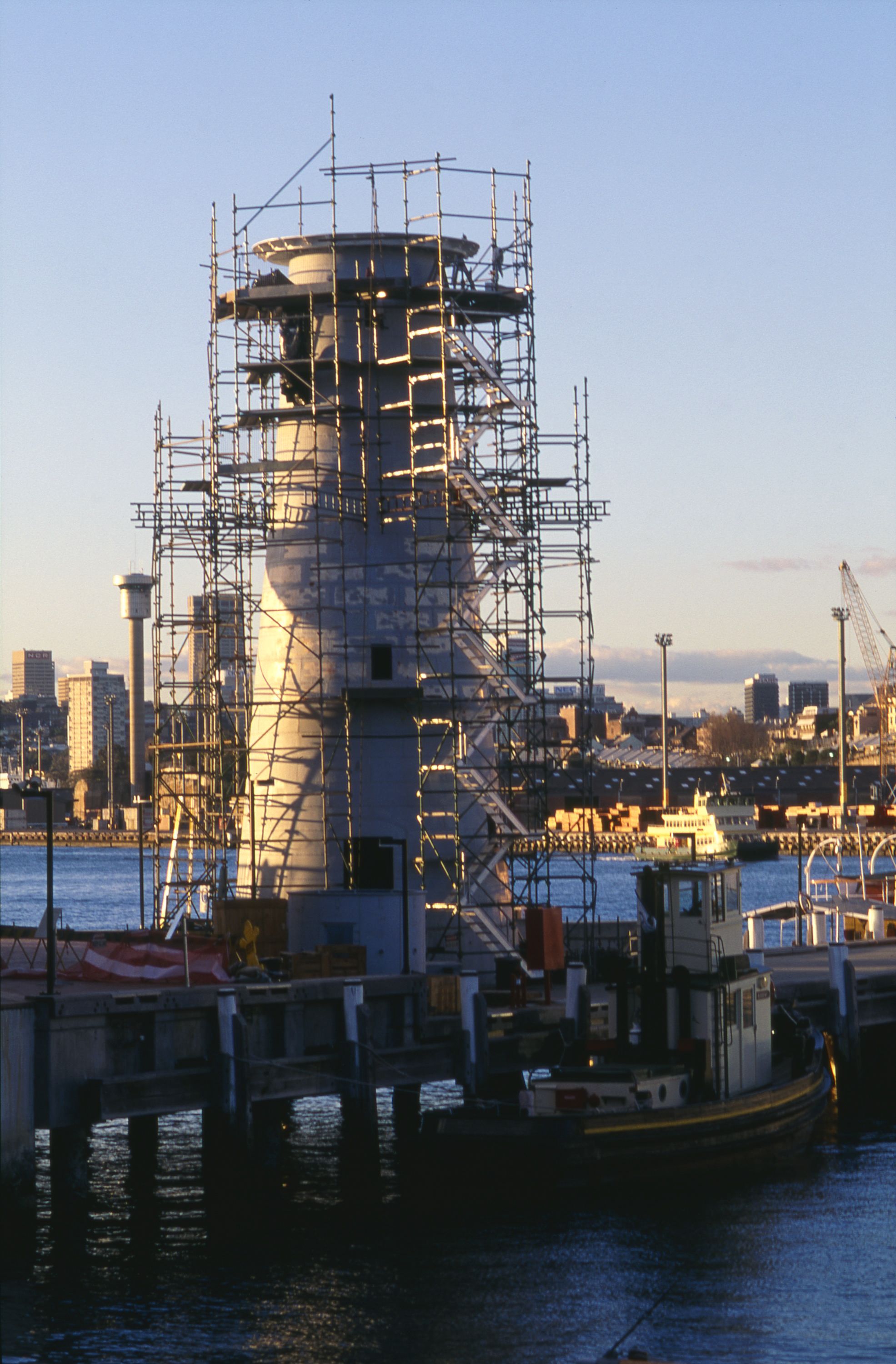 Photo of a lighthouse surrounded by scaffolding