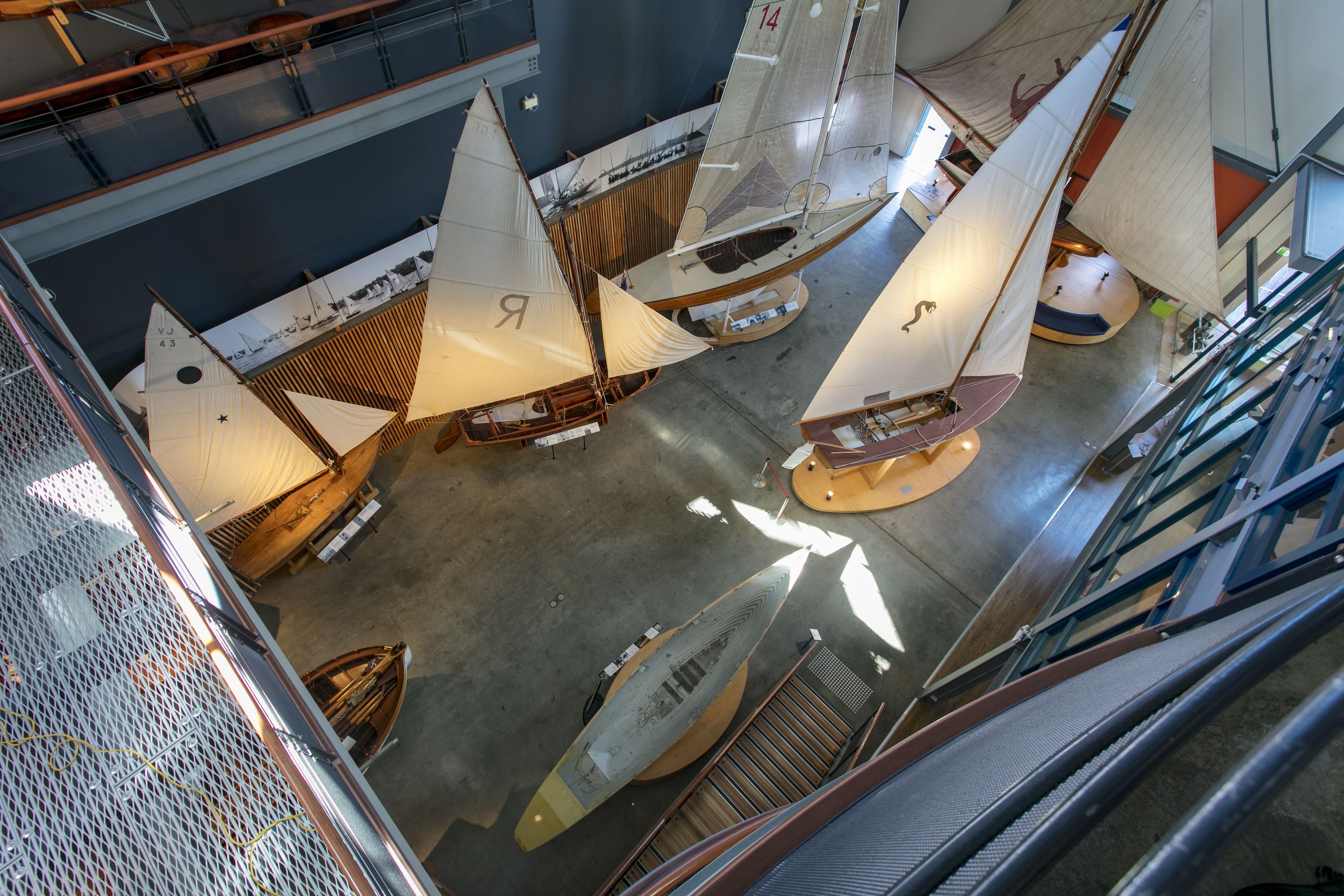 Overhead view of the Sydney Heritage Fleet sail boat display inside the foyer