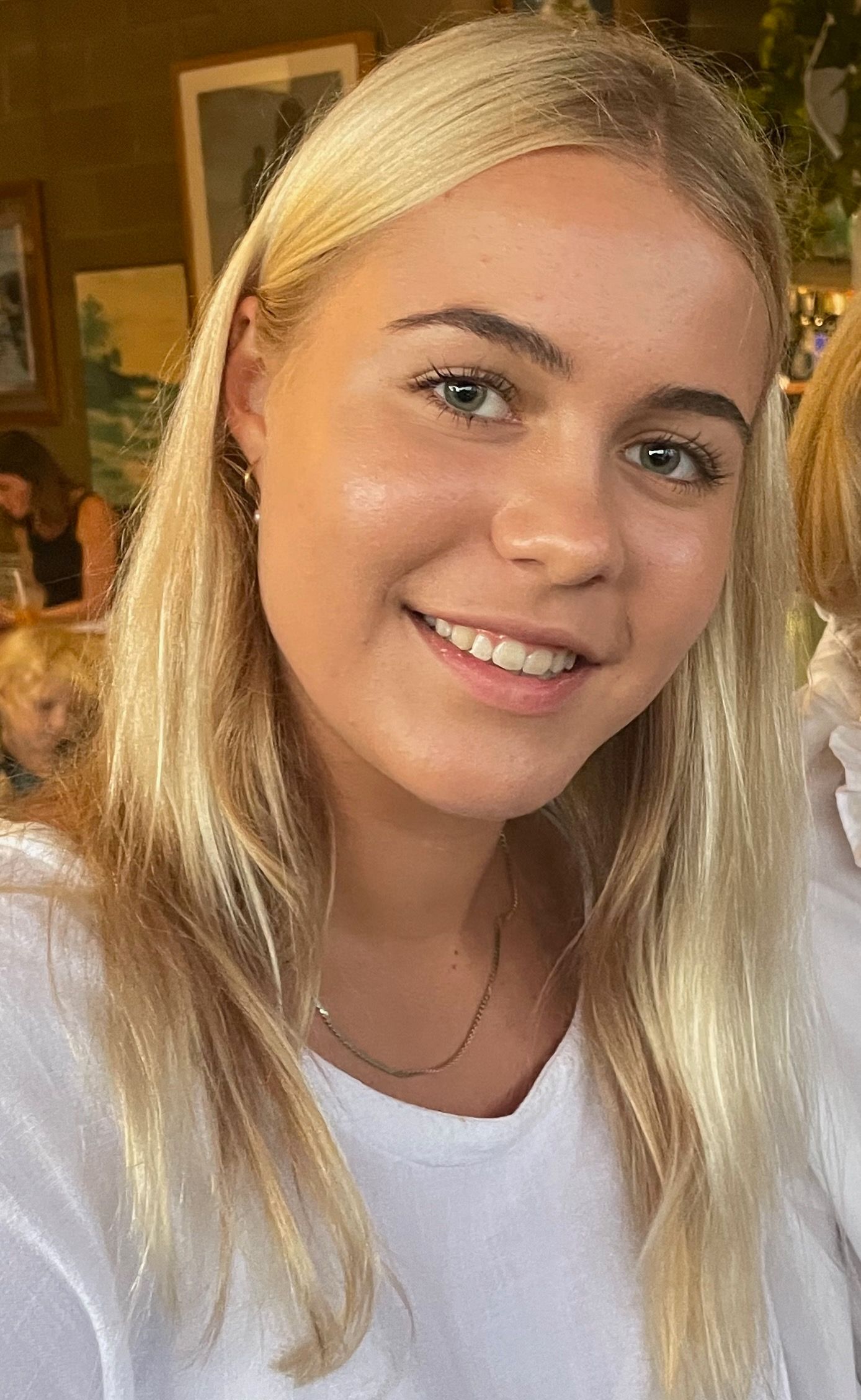 Photo of a young woman with long blond hair 