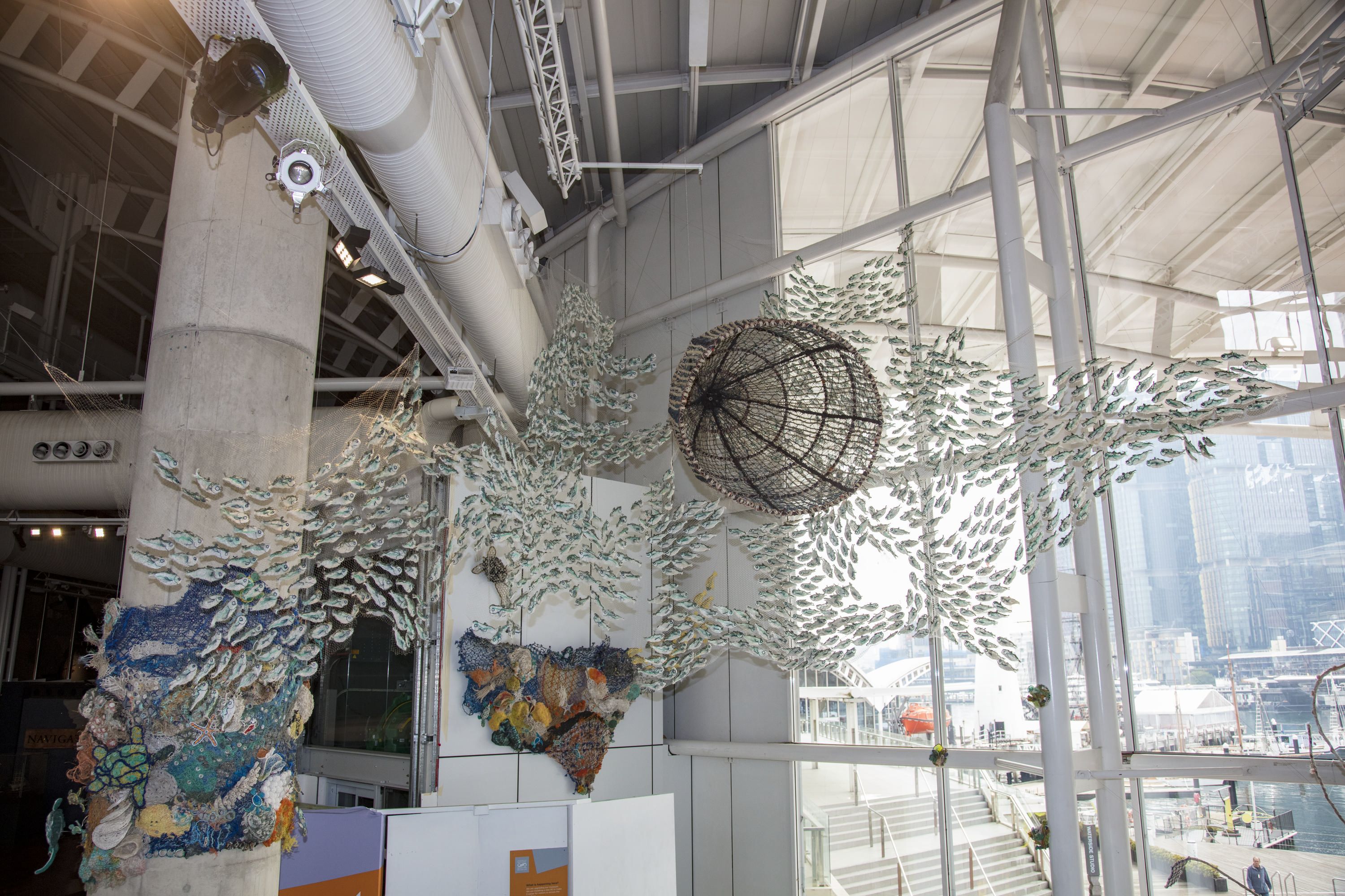 Sculptures including schools of fish, coral reefs and a fish trap made from recycled fishing line and discarded nets. 