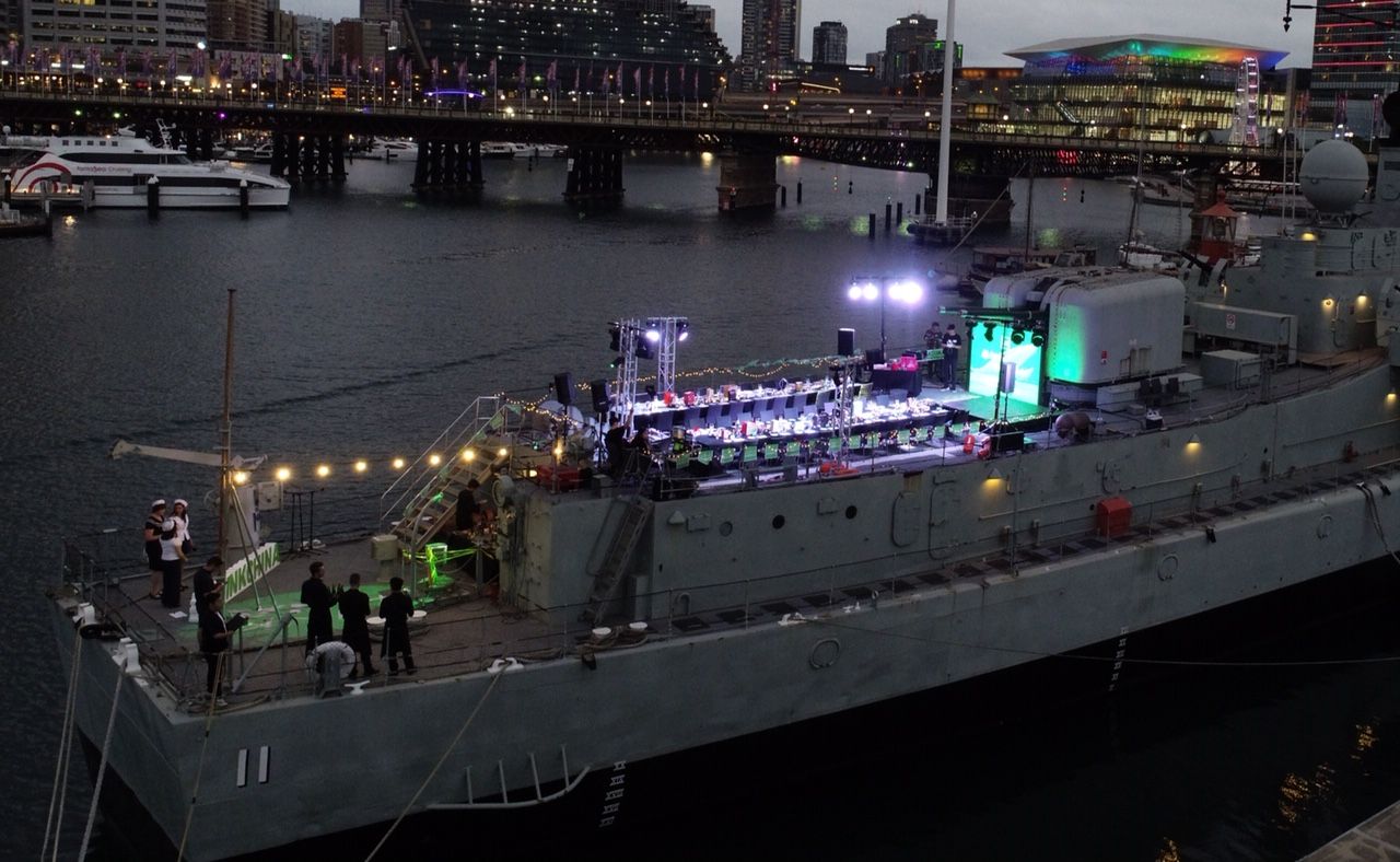 Event space showing HMAS Vampire set up for a dinner