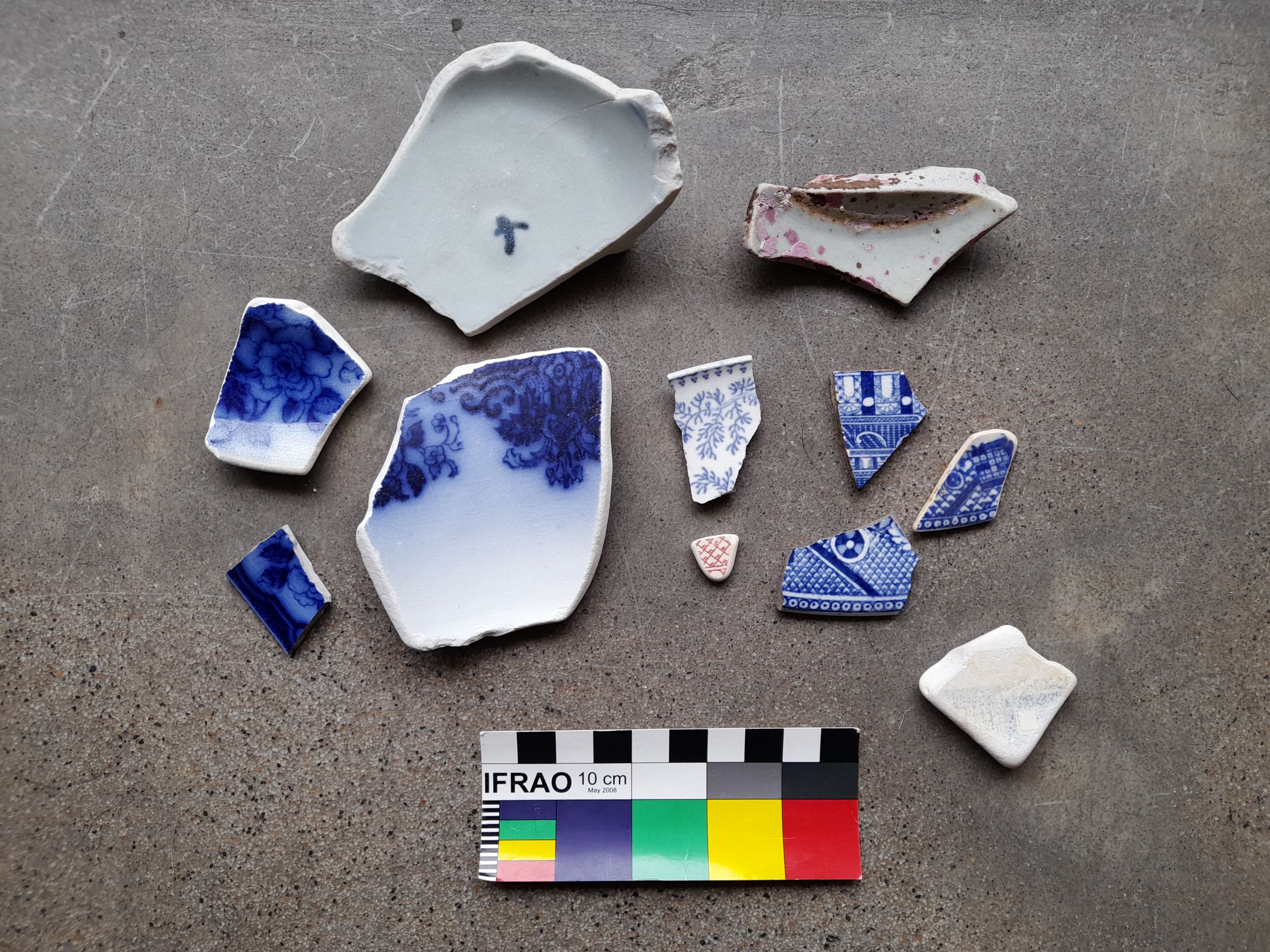 collection of broken pottery fragments
