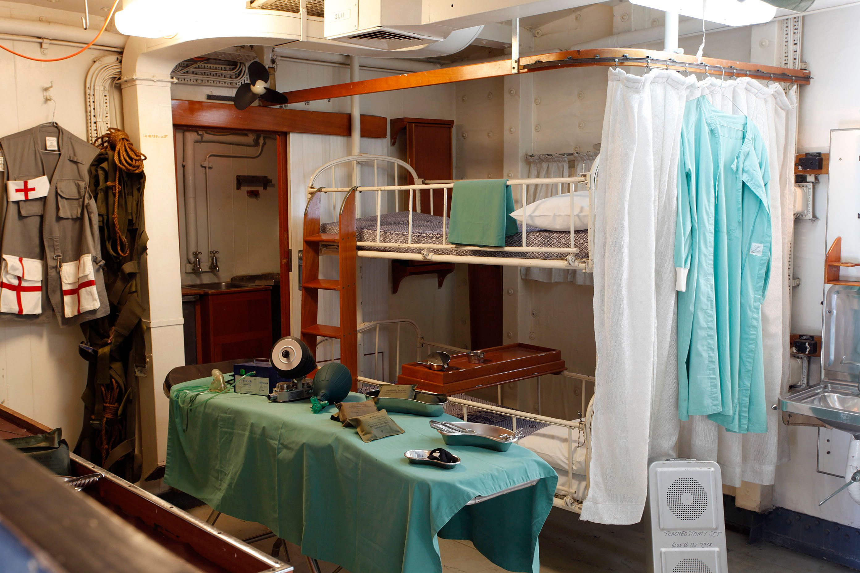 Photo showing a medical bay in a navy ship.