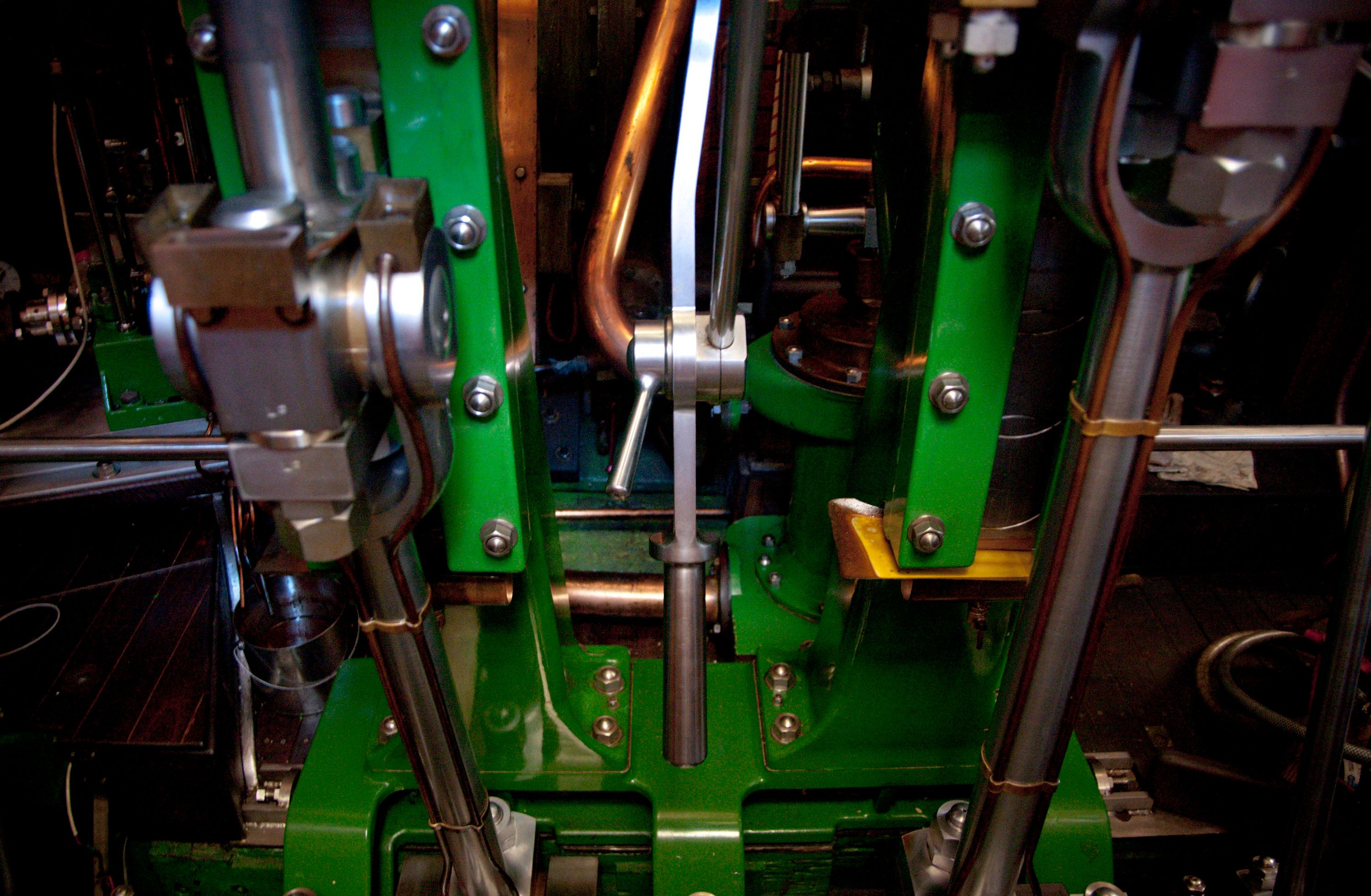 Interior views showing the steam engine of the vessel.