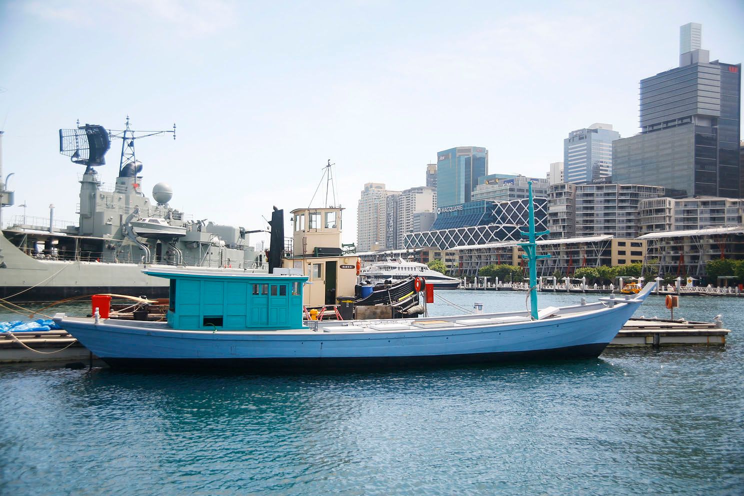 Blue fishing vessel on the water