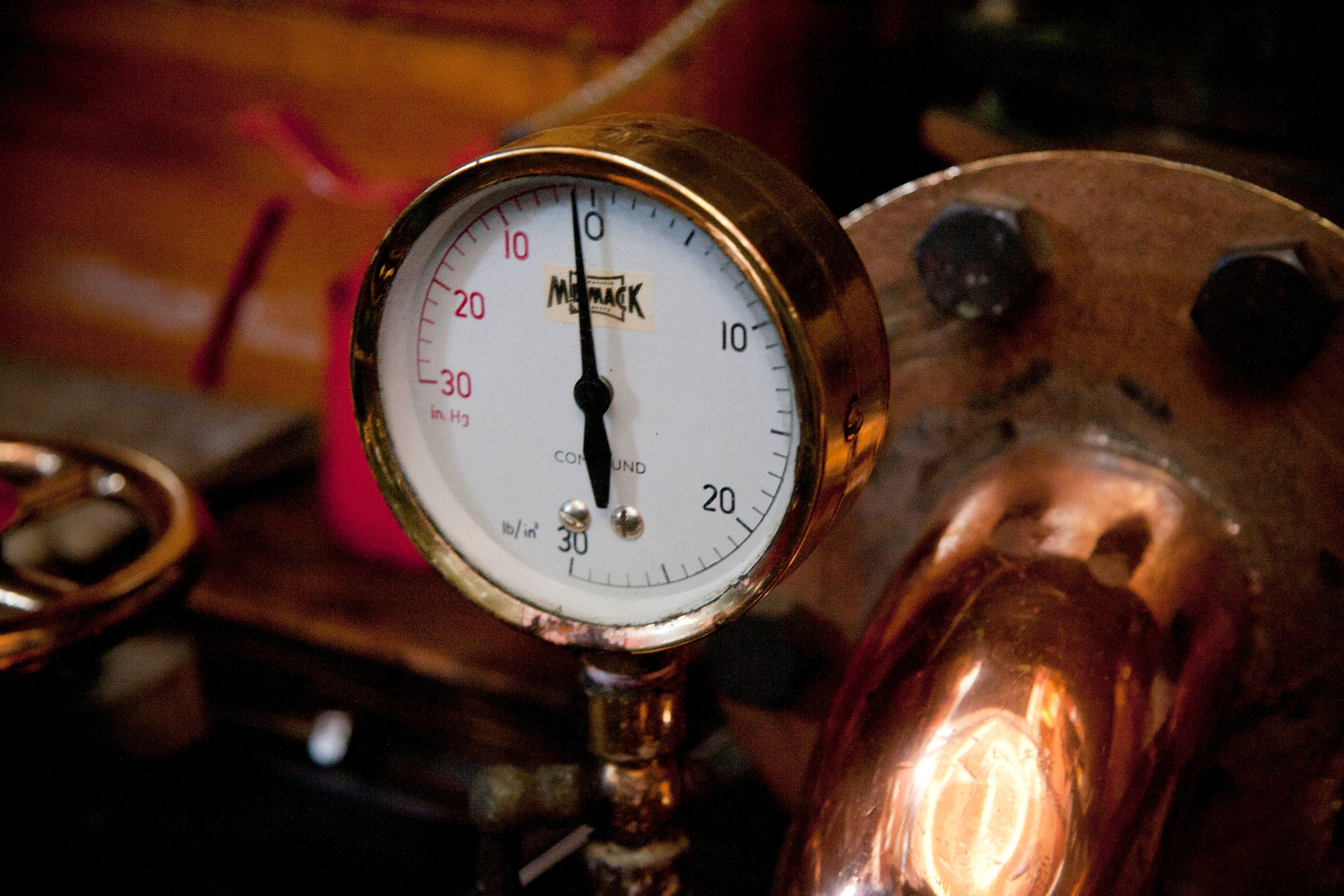 A dial is shown in the engine room of steam yacht Ena.